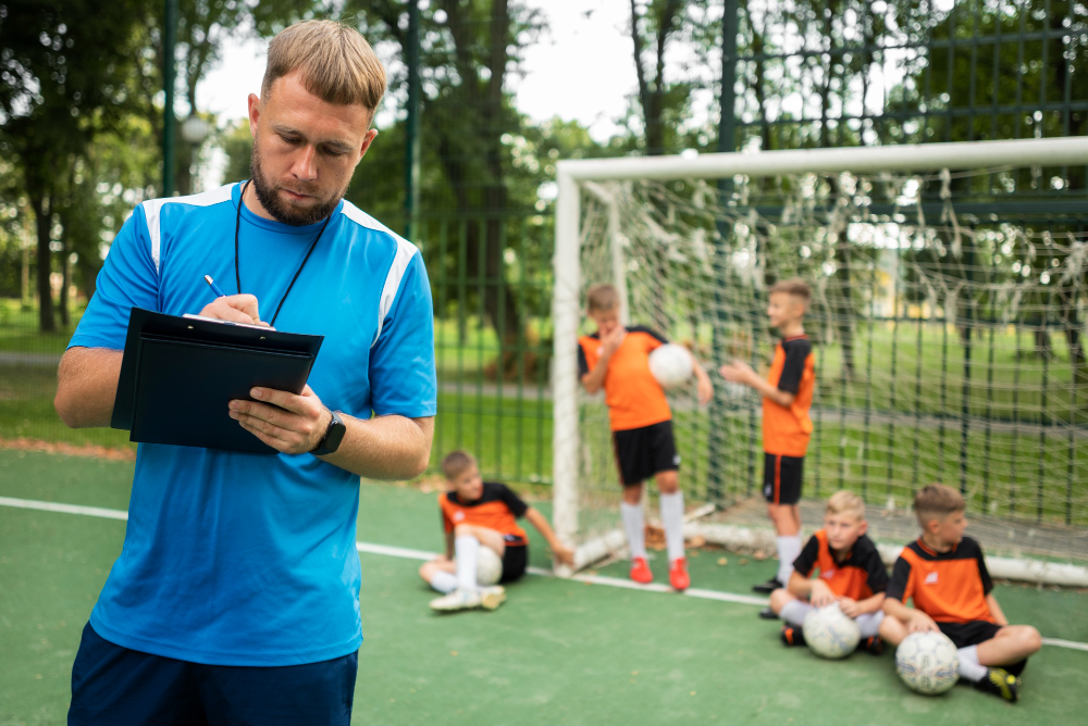 football-trainer-teaching-his-pupils (1)